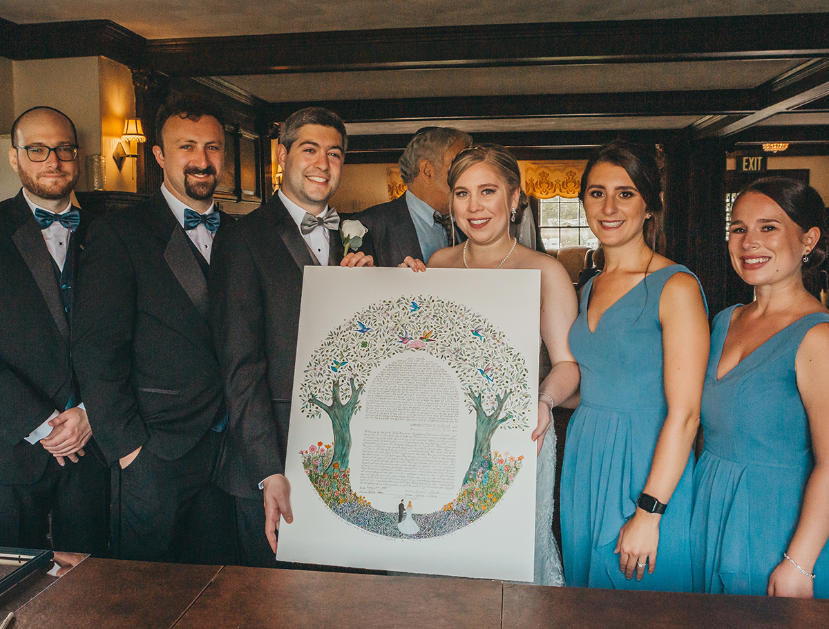 Gale Evans Ketubah signing with wedding party